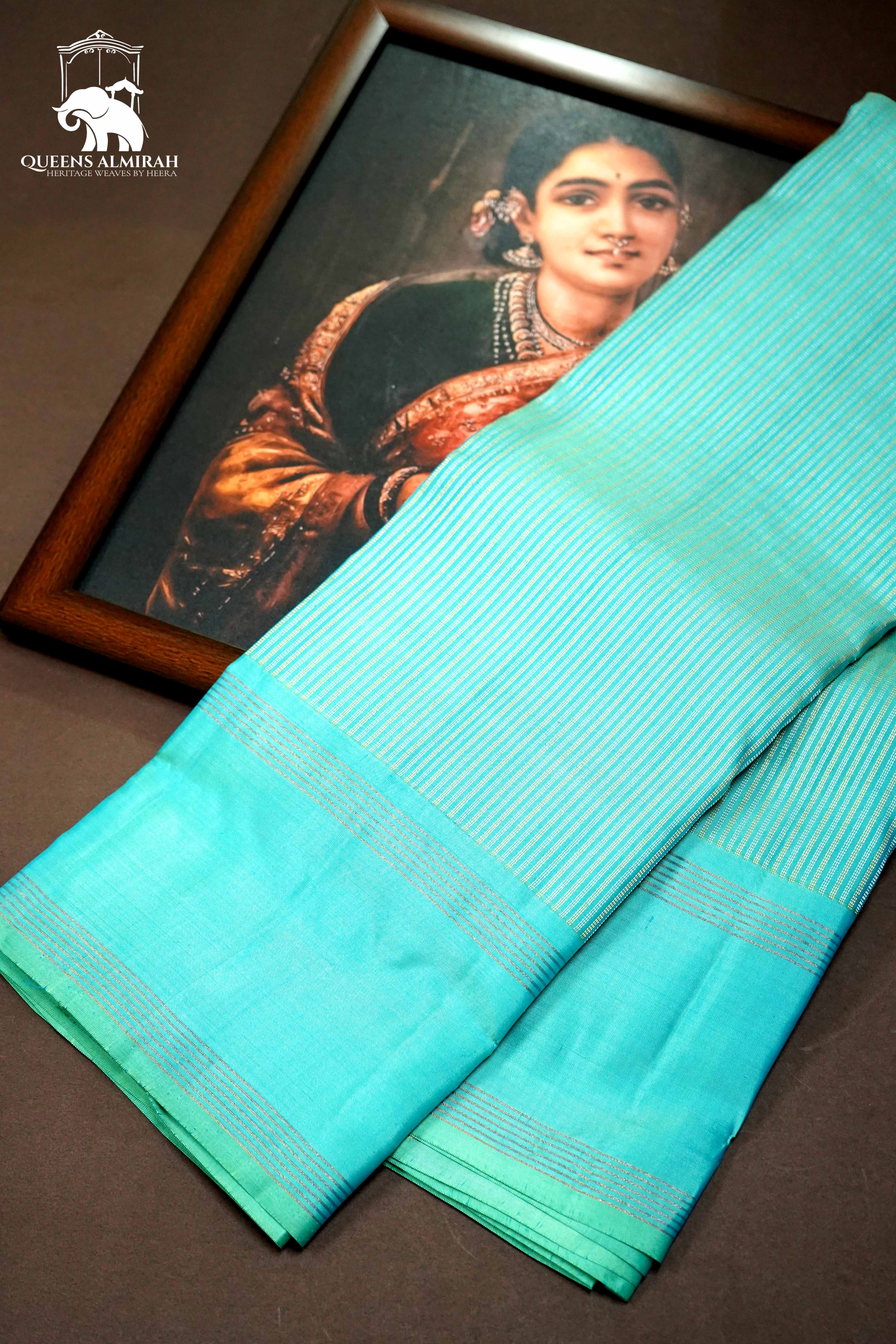 LIGHT TURQOISE BLUE WITH WOVEN BORDER KANCHIVARAM SILK SAREE - Queens Jewel Emporium