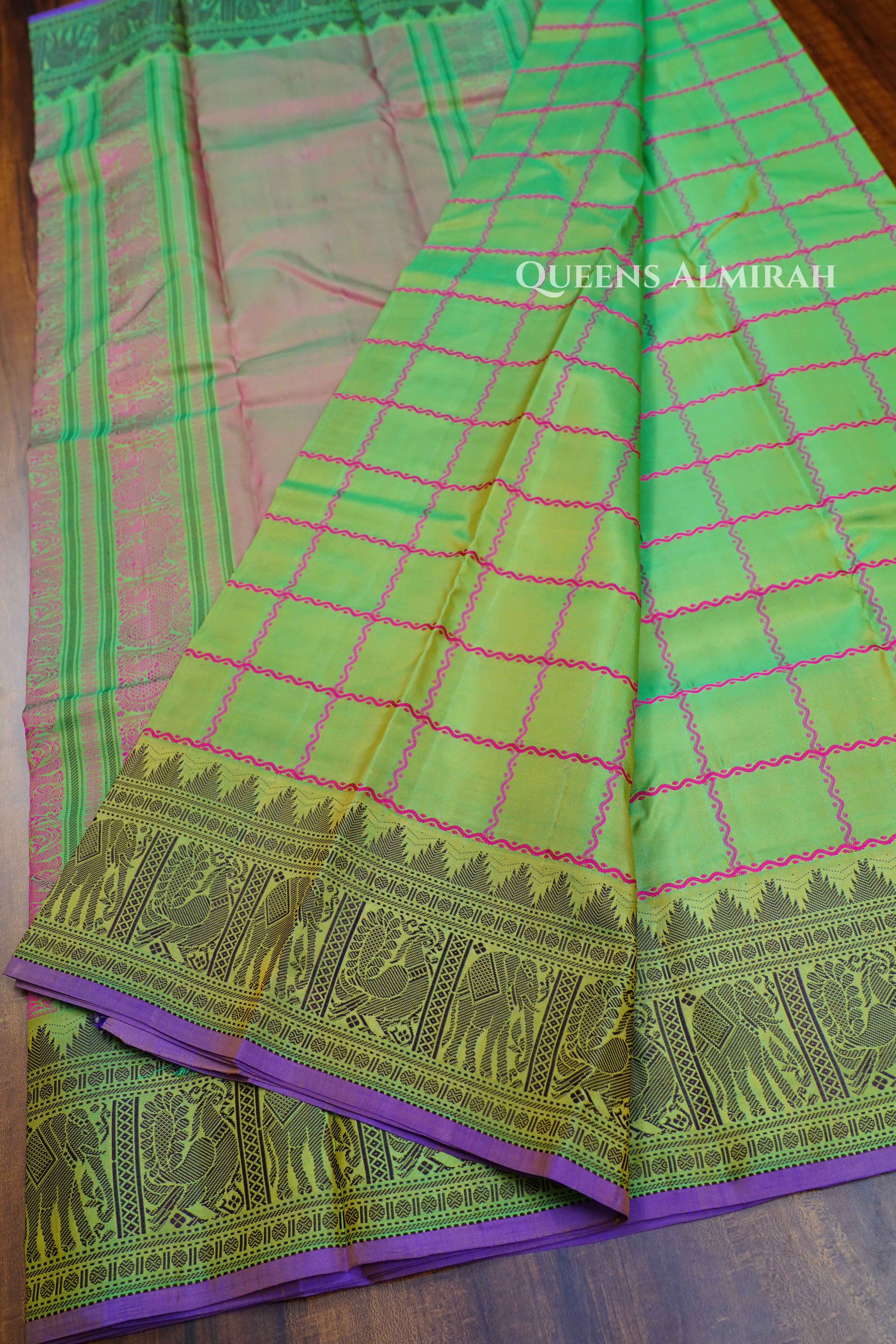 Parrot Green Pure Kanchivaram Silk Saree . QUEENS ALMIRAH