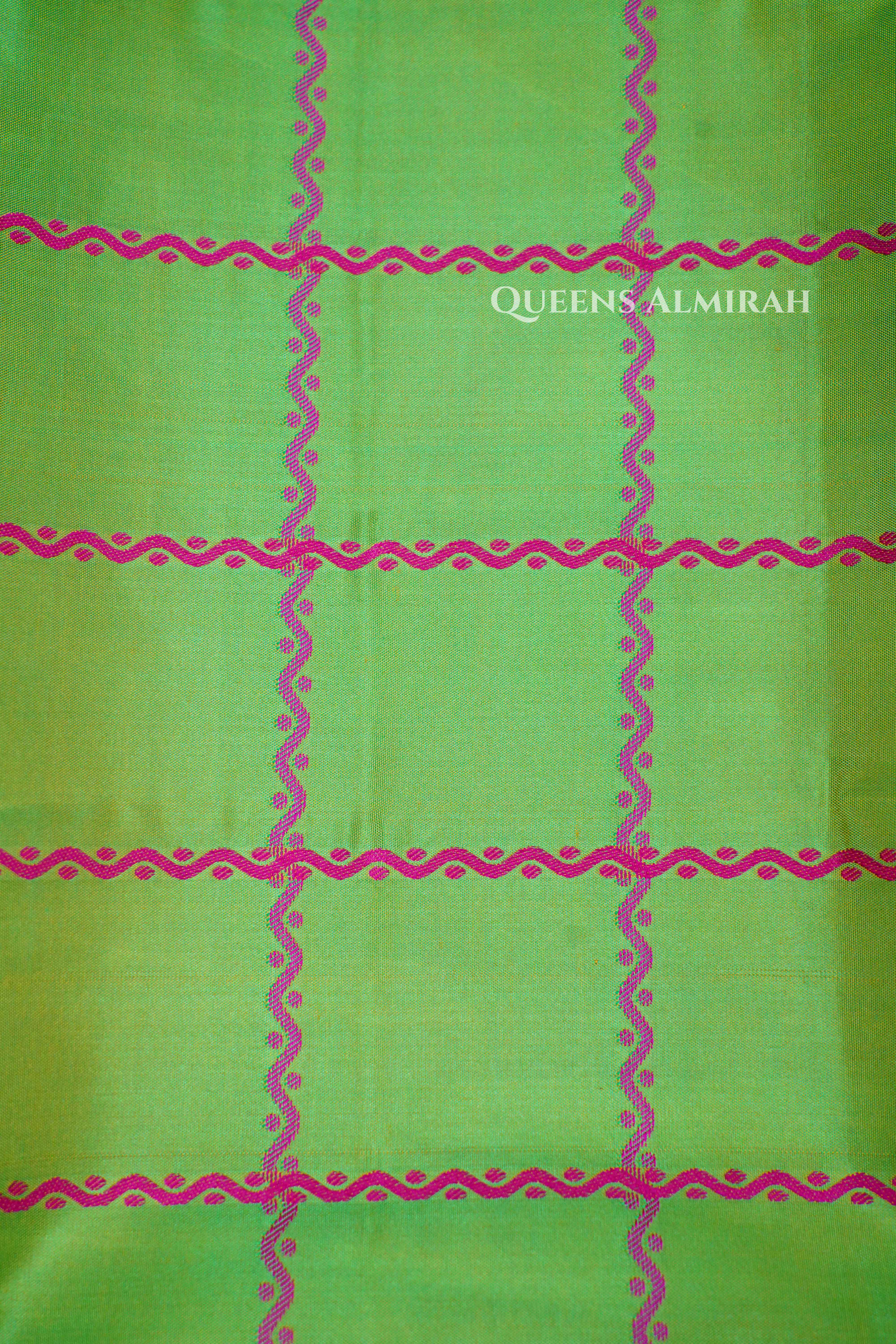 Parrot Green Pure Kanchivaram Silk Saree . QUEENS ALMIRAH