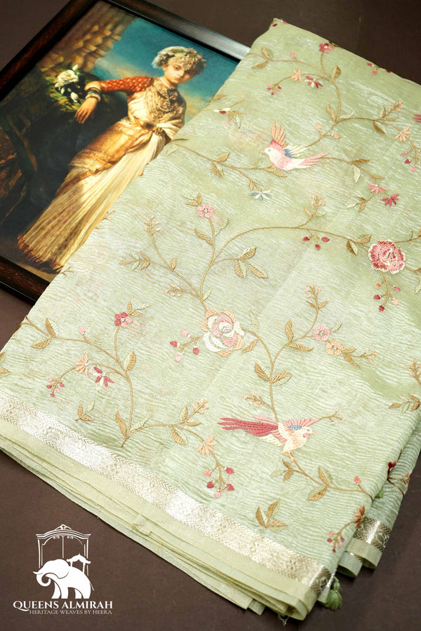 TEA GREEN WITH WOVEN BORDER TISSUE SAREE - Queens Jewel Emporium