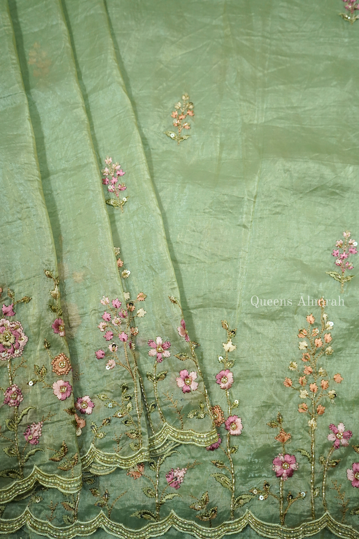 GREEN SMOKE WITH EMBROIDERY BORDER TISSUE SAREE - Queens Jewel Emporium