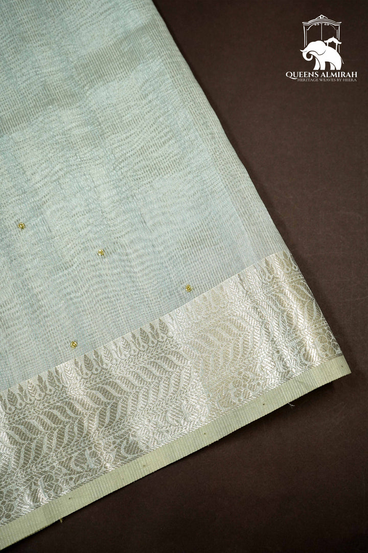 LIGHT SILVER WITH WOVEN BORDER TISSUE SAREE - Queens Jewel Emporium