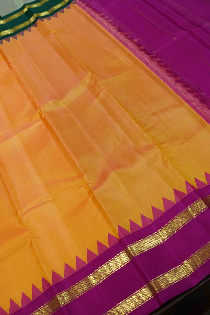 PUMPKIN ORANGE WITH BOTTLE GREEN AND MAGENTA PURE KANCHIVARAM SILK SAREE - Queens Jewel Emporium
