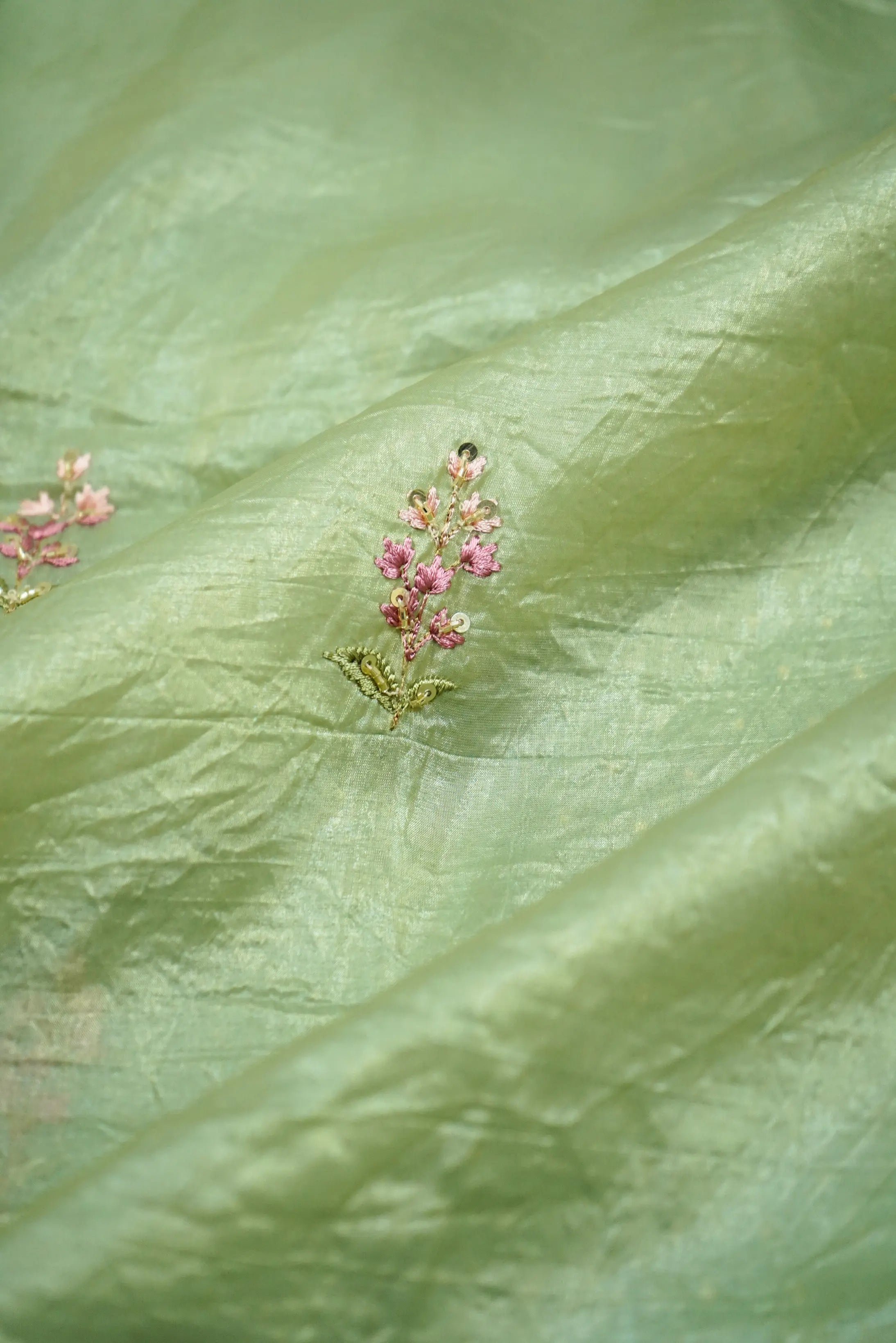 GREEN SMOKE WITH EMBROIDERY BORDER TISSUE SAREE - Queens Jewel Emporium