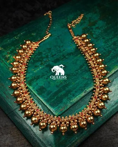 Red color stones , Gold ball design jewellery , Statement Haram