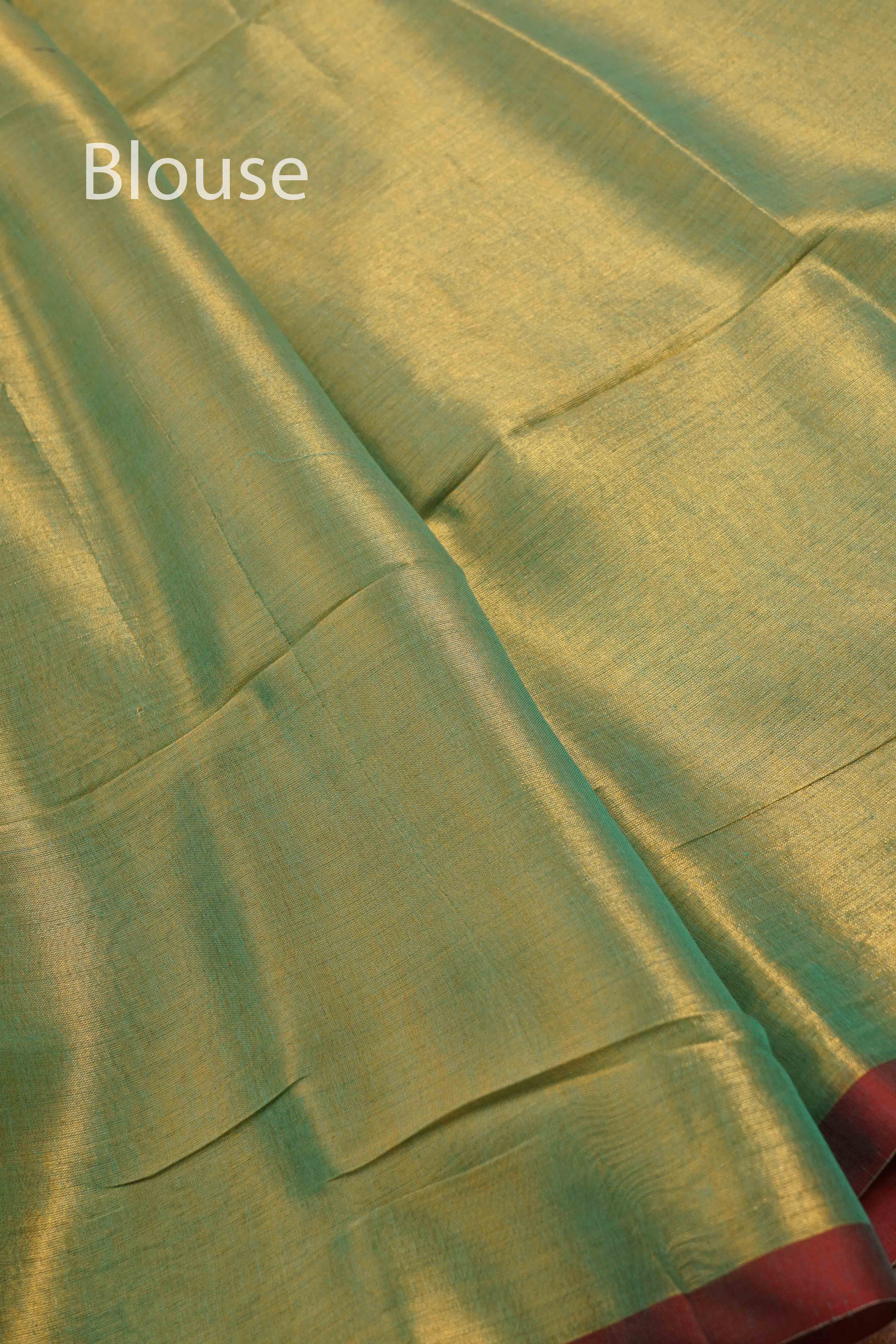 PASTEL GREEN LINEN TISSUE SAREE - Queens Jewel Emporium
