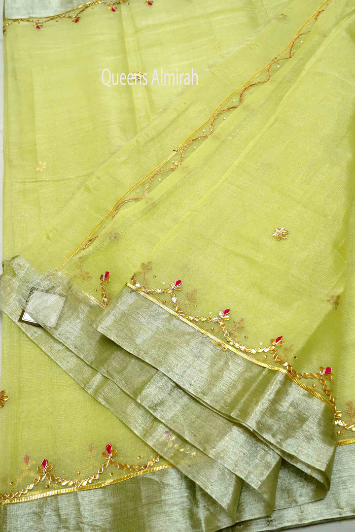 DUSKY GREEN KOTA TISSUE SAREE - Queens Jewel Emporium