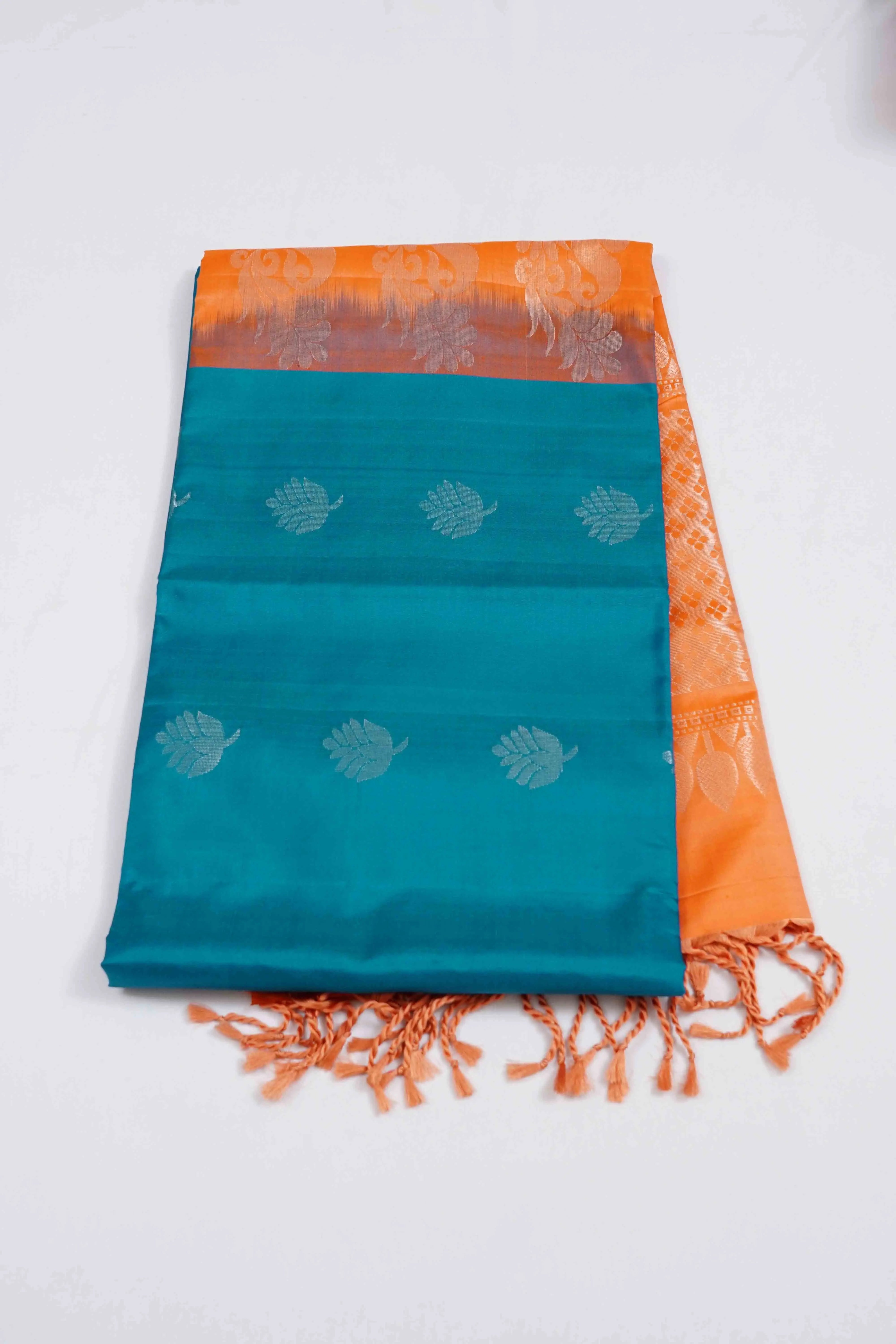 TEAL BLUE WITH DUSKY ORANGE PURE SOFT SILK SAREE - Queens Jewel Emporium