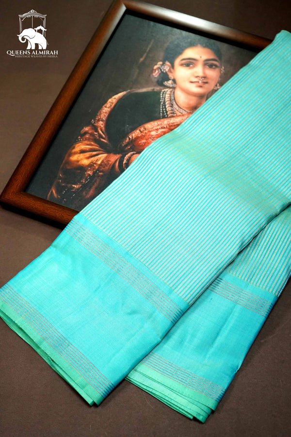 LIGHT TURQOISE BLUE WITH WOVEN BORDER KANCHIVARAM SILK SAREE - Queens Jewel Emporium