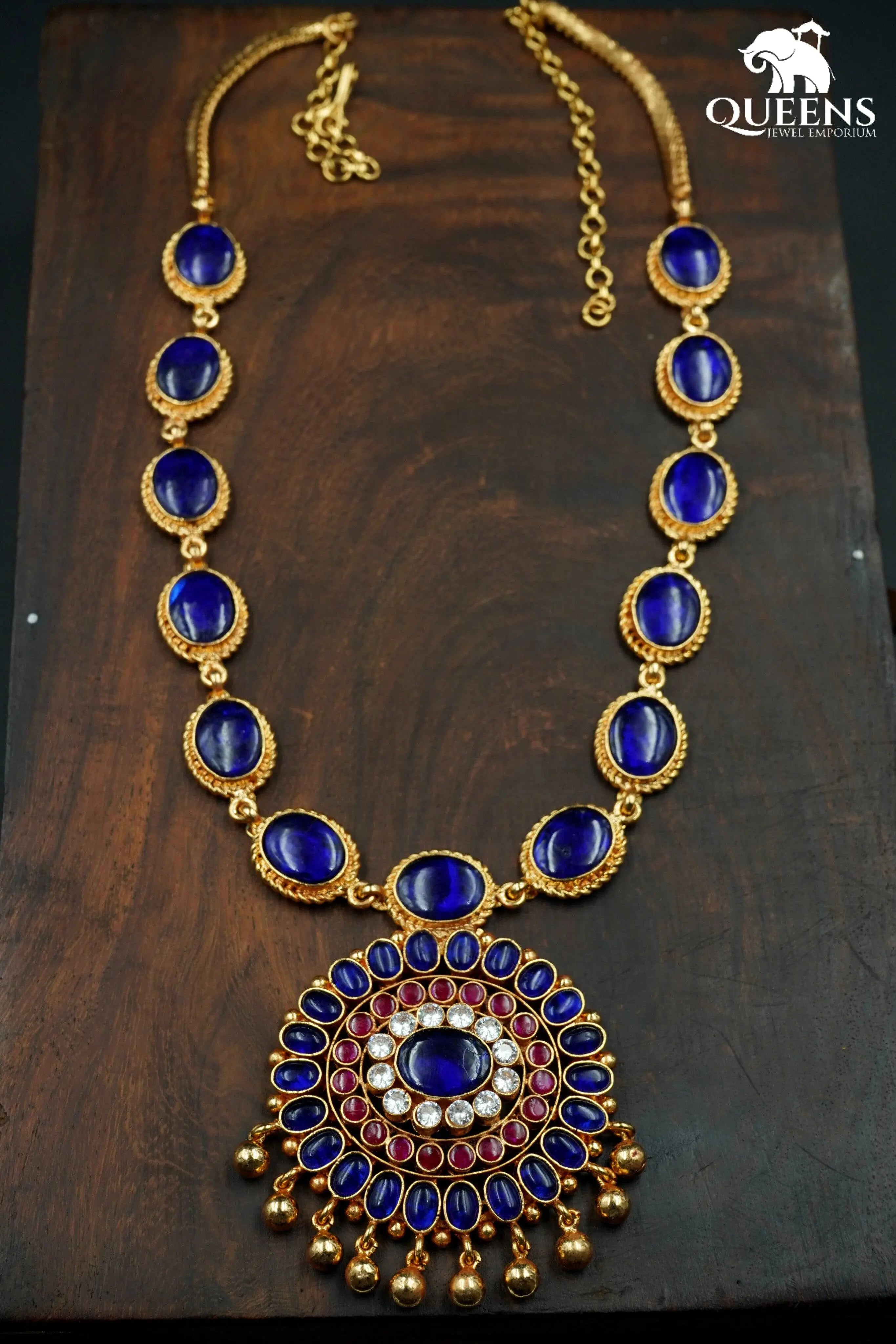 Vibrant blue oval stones-Floral motif pendant design