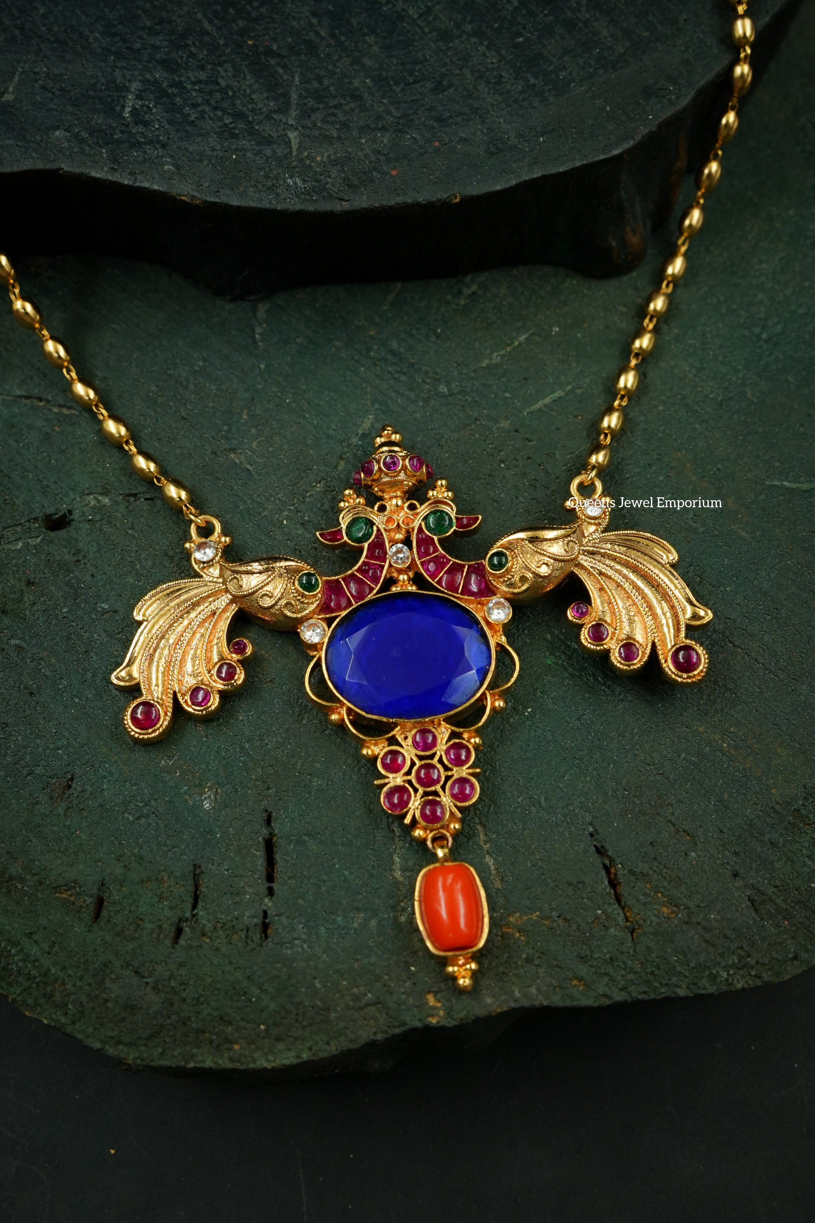 Nagas peacock motif pendant-Blue cutting stone