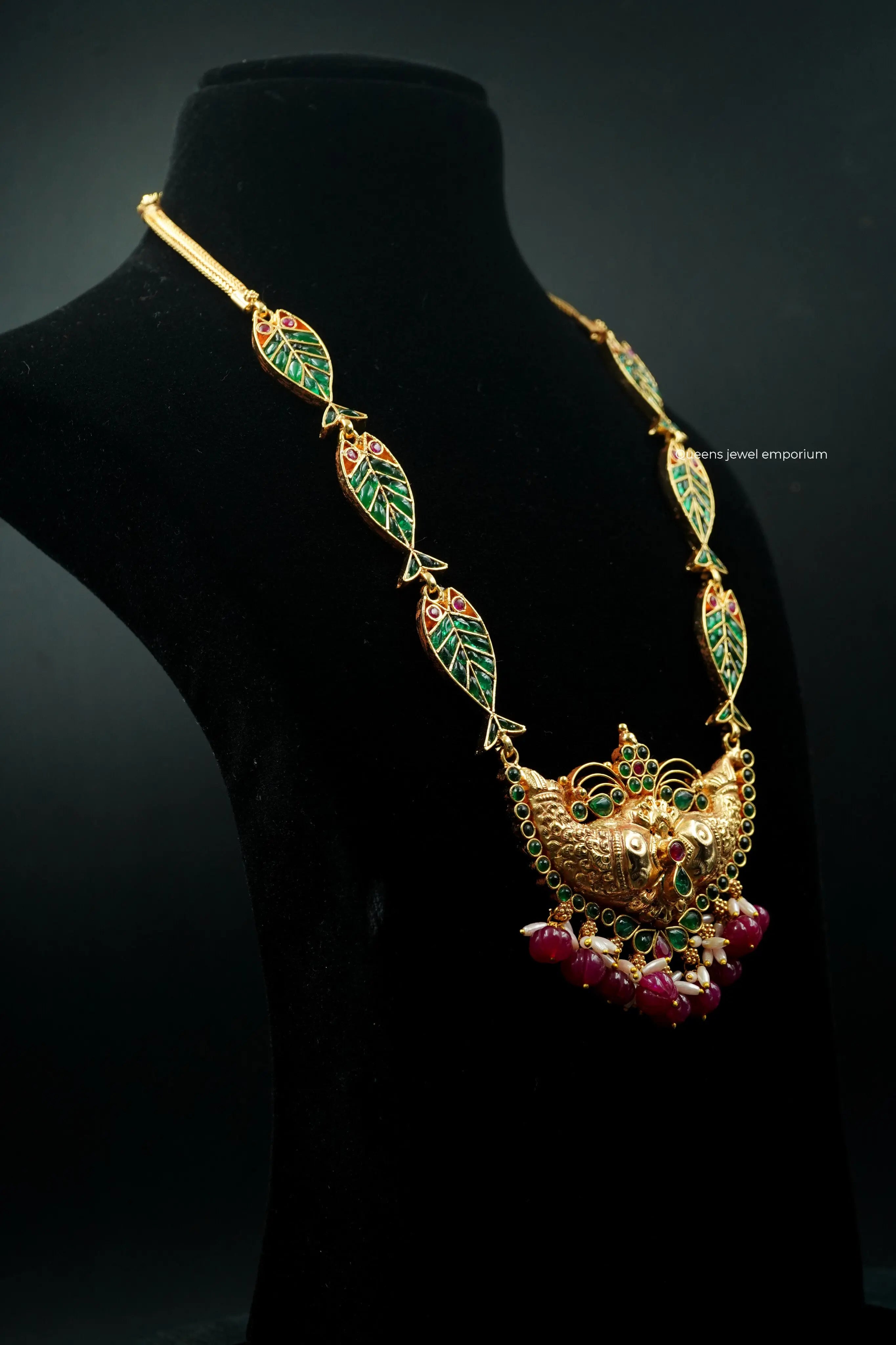 Nagas fish motif pendant with haram-Green color stone
