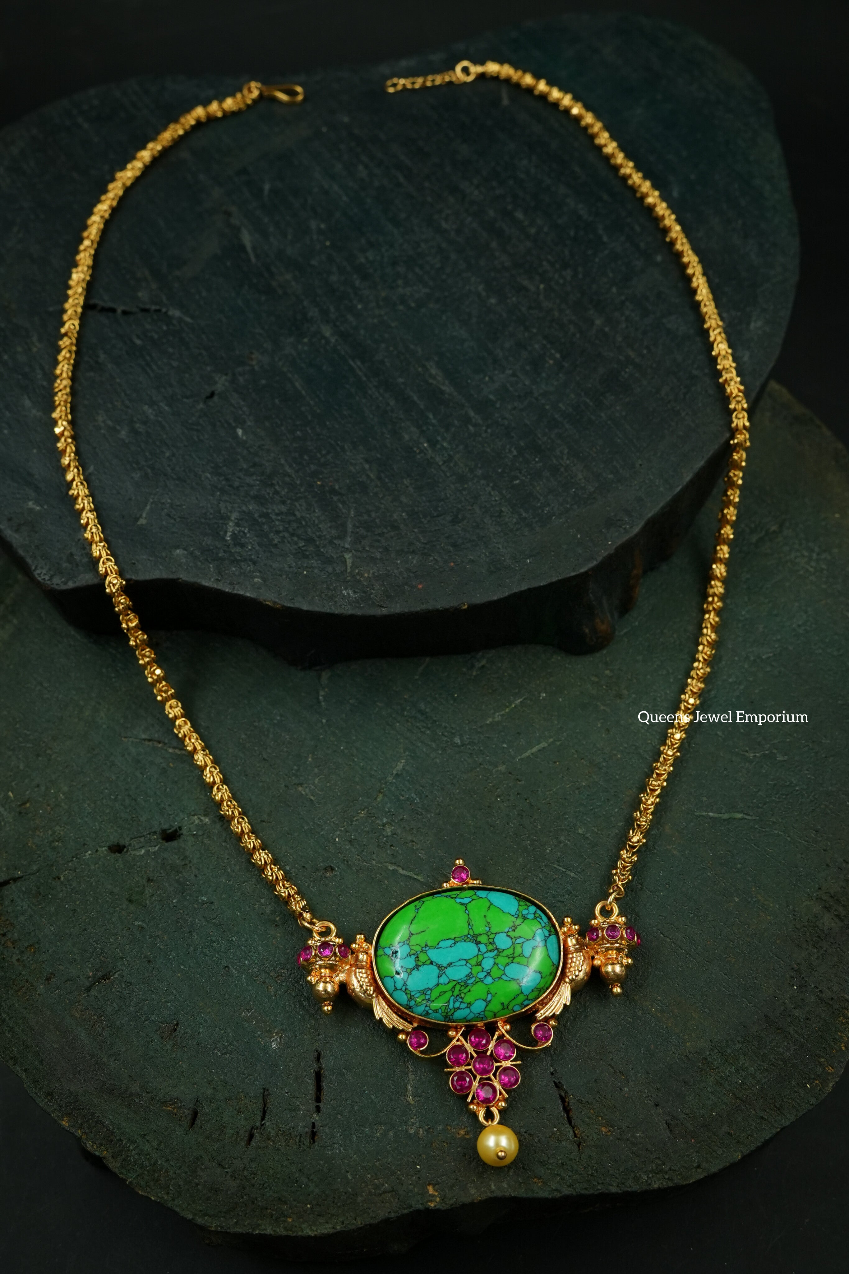 Turquoise stone pendant-Nagas Kizhi motif pendant