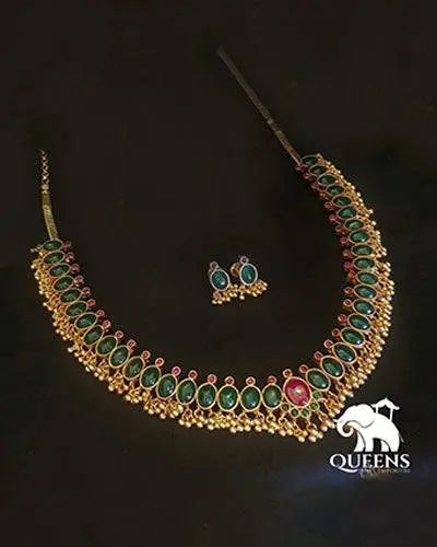Jewellery set for reception-Mid length haram with green stones