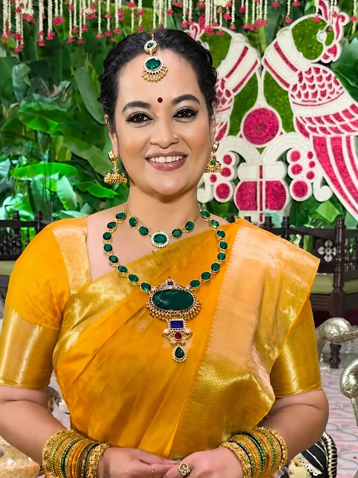 Oval green stone jewellery set-Green stone jewellery for sarees