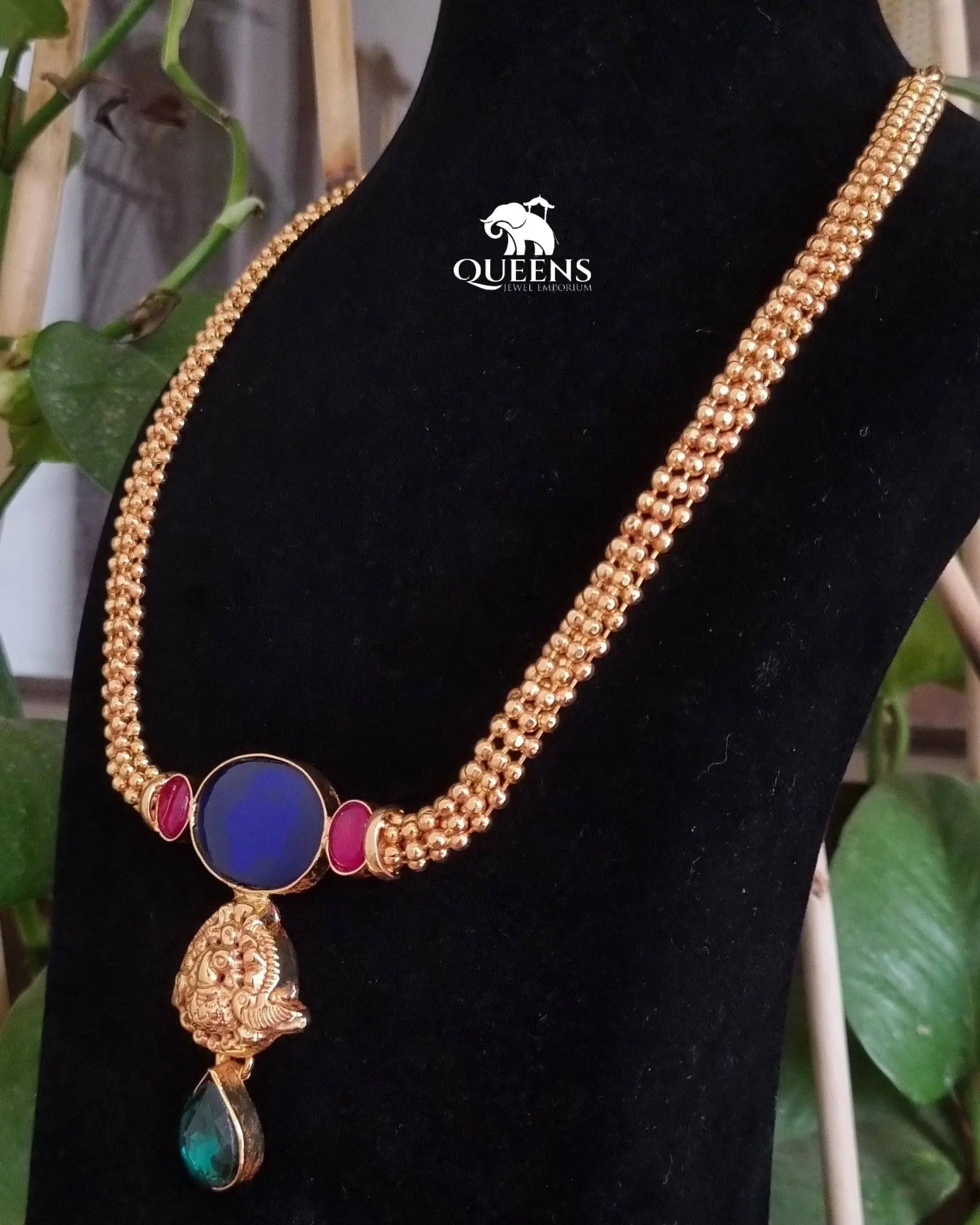 Blue oval stone-Nagas bird motif design